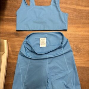 Girlfriend Collective High Waist Shorts in Light Blue + Paloma Sports Bra